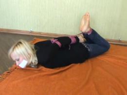 Phoxy in Jeans foxy is hogtied in jeans and a black shirt. Her arms are tied well behind her and she enjoys a tape gag. She struggles but not as much as her other videos. This was found on kinbakublogger.blogspot.kr