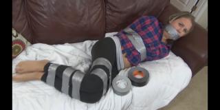 Samantha Thomas: Duct taped and double gagged In this clip Samantha finds herself, once again, in an all too familiar position.. tightly duct taped. Samantha has spent a good bit of time duct taped during her previous shoots with me so it was time to give her the duct tape treatment once again. Laying on the couch sporting a long sleeve shirt and some sexy yoga pants, Samantha's wrists, ankles, legs and arms are tightly, tightly taped up with heavy duty tape. She is gagged with a bandana which is followed up with the popular wrap-around-the-head duct tape gag which is very uncomfortable for this little cutie. Samantha is left in that cruel position to struggle, grunt and mmpphh emphatically as she attempts to loosen that extremely tight duct tape. https://www.clips4sale.com/studio/44920/15555802/samantha-thomas-duct-taped-and-double-gagged<br>