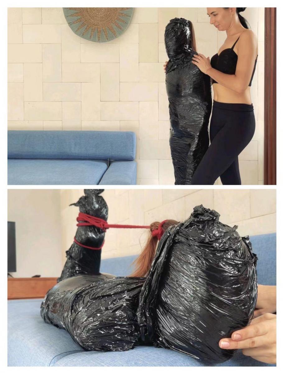 HOGTIED MYMMY BREATH PLAY HD Vita never tried mummification. We gladly gave her the opportunity to try it out, and at the same time we recorded it all on camera for you dear subscribers! Vita was completely wrapped with stretch, she had a small gap for mouth and hair. From the hair to the feet came a rope to support her head high. We would occasionally plug the click and the Vita could not breathe. Then we let go of our hand, and the vita swallowed the air greedily. It lasted 20 minutes. When we released it, about a liter of sweat slipped on the sofa.