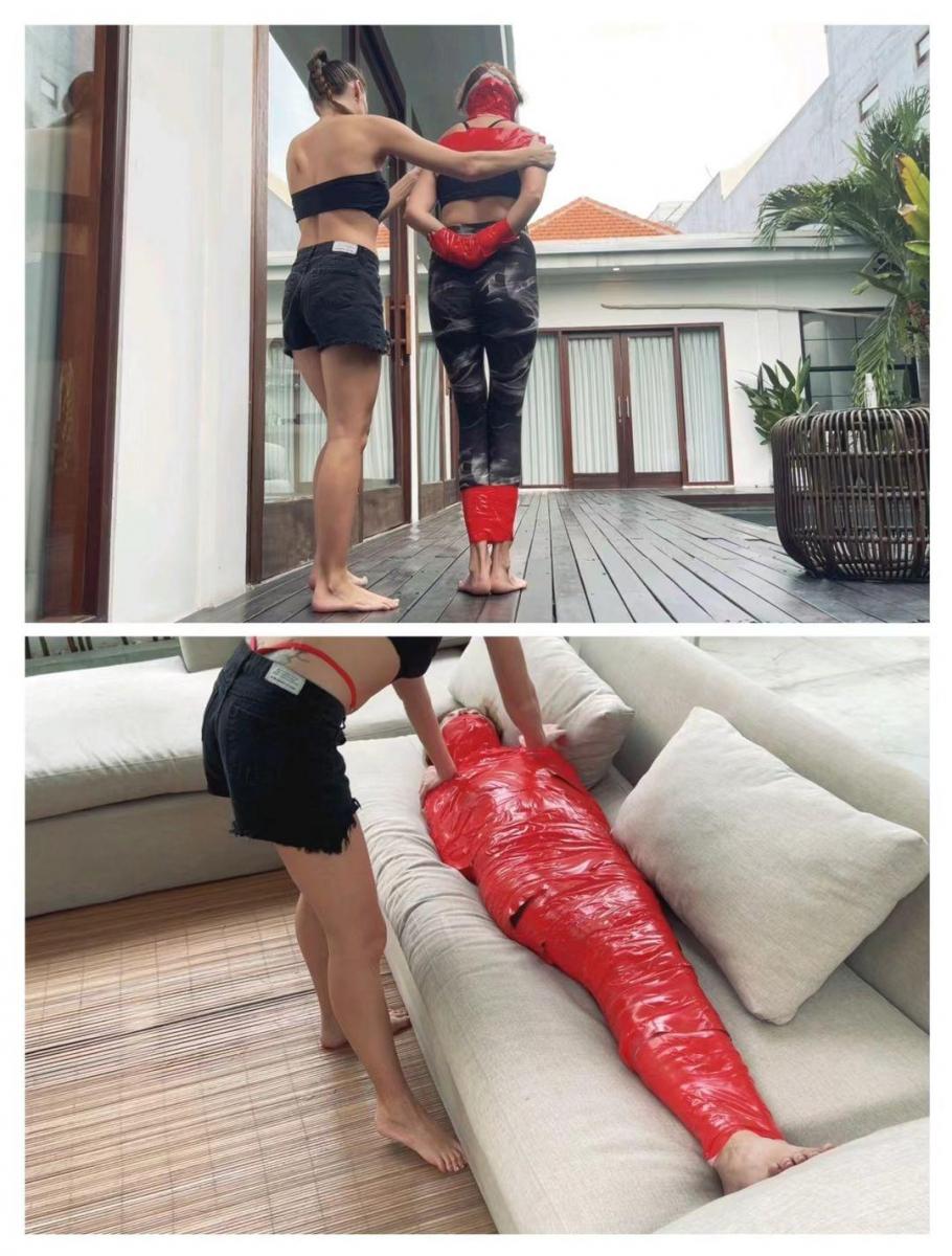 ROBBERY ATTEMPT BONDAGE HD The mafia boss sent his best agent on a mission. She must find dirt on her boss's enemy. There must definitely be something in his house that could eliminate a competitor forever. Agent Chloe entered the house and began searching. And then she finds a rubber penis, which the owner of the house most likely played with. But they were already waiting for Chloe... When she woke up, her arms, legs and head were wrapped in tape. Chloe got up and began to look for a way to free herself, she jumped around the house, looking for a way out, but she couldn’t escape. Agent Vita brought her to the bed. So that Chloe could no longer escape, Vita completely wrapped her in tape, like a mummy. The owner of the house was already on his way home to question Agent Chloe. And while the owner was driving at home, Vita decided to have fun and began tickling Chloe’s bare feet.