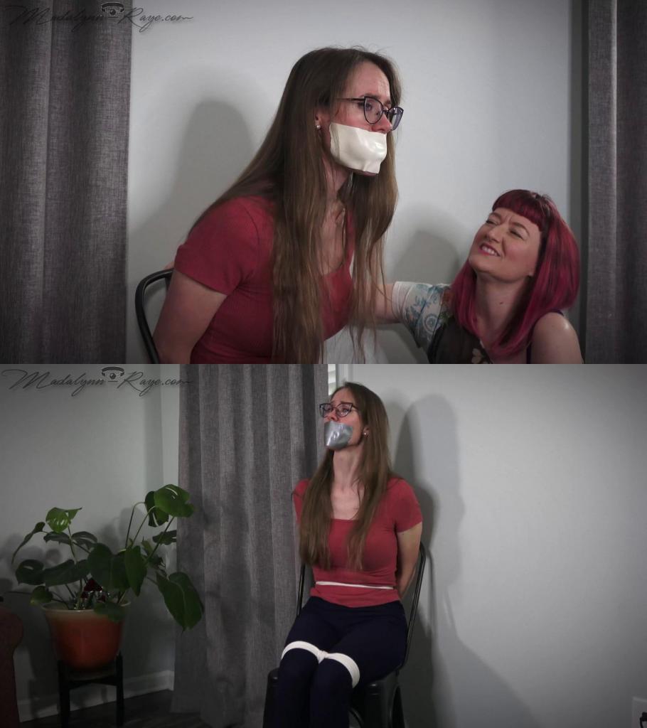 Madalynn's Gag Talk Falls on AJ's Deaf Ears 麦迪刚结束漫长的一天回到家，正期待着一个安静而轻松的夜晚，这时她听到走廊里有碰撞声。她出去调查并被捕。<br><br>她被绑起来，嘴里塞满内裤，嘴上蒙着一层厚厚的微泡沫带。当你听到犯罪分子在屋子里翻找东西时，她正在呕吐，大骂一场暴风雨。这种情况持续了一段时间，尽管马达琳很活跃，但她无法与将她固定在椅子上的绳索相抗衡。手臂放在背后，一根紧腰的绳子，在膝盖和脚踝上方的绳子，她咕哝着，哼哼着并扭动身体，直到她的室友回家并宣布她的到来，而罪犯则从窗户溜了出去。<br><br>约会结束后，AJ 满心欢喜地进来，认为马达琳和她的约会对象正在玩一些古怪的捆绑游戏。 AJ 喜欢它的外观，但认为她不喜欢把它塞进嘴里。如果有机会被绑起来，她会选择嘴里不塞东西。<br>马达琳很困惑，试图把脸上的填充物和胶带撕下来，但它太粘了，无法松开。 AJ 对她的发现很着迷，甚至稍微收紧了 Maddy 的束缚。马达琳愤怒又抱怨，试图解释他们被抢劫了，但 AJ 就是不明白。<br><br>最后，AJ 注意到一些胶带和塞在一边的东西，因为她很确定这就是麦迪的男朋友想要的。 AJ 撕下微泡沫，然后慢慢地将湿透的内裤从 Maddy 的嘴里取出，但在 Madalynn 解释情况之前，AJ 将一块白布塞进 Maddy 的嘴里，并用留在厨房的三条胶带将其紧紧密封。 。 AJ 去洗手，但发现有些东西不见了。<br>玛达琳恳求 AJ 回来并解开她的束缚，但 AJ 就是不明白，然后玛迪的电话开始响了。<br><br>这是玛达琳的男朋友，玛蒂试图向她的男朋友解释，希望他能理解，但无济于事……AJ 与男朋友交谈，问他什么时候回来给她解开绳子，并告诉 AJ 他没有这样做。 AJ 终于明白了要点，开始解开 Madalynn 的绳子。<br><br>AJ 抱怨她的绳结太紧，导致她的手抽筋，但她松开了马达琳的手，并告诉她解开绳子。<br><br>Maddy just got home from a long day out and is anticipating a quiet and relaxing night in when she hears something crash in the hallway. She goes out and investigates and is apprehended.<br><br>She gets tied, mouth stuffed with panties and a thick microfoam strip over her mouth. She’s gag bitching up a storm as you hear the perp rifling through things through out the house. This goes on for a while and despite Madalynn being feisty, she’s no match for the rope bondage securing her to the chair she’s been placed in. Arms behind her back, a tight waist rope, above the knee and ankle rope, she’s grunting, mmpphing and wiggling until her roommate comes home and announces her arrival as the perp snuck out a window.<br><br>AJ comes in all happy and bubbly after her date and thinks Madalynn and her date are playing some kinky tie up games. AJ loves the way it looks but doesn’t think she’d like the mouth stuffing in her mouth. If she had the opportunity to be tied up, she would opt for no stuffing in her mouth.<br>Madalynn is bewildered and trying to push the stuffing and tape off of her face but it is just too sticky to loosen. AJ is enchanted by her findings and even tightens Maddy’s ropes a bit. Angry and bitching, Madalynn tries to explain they’ve been robbed but AJ just isn’t getting it.<br><br>Finally AJ notices some tape and stuffing off to the side because she’s pretty sure that’s what Maddy’s Boyfriend would’ve wanted. AJ pulls the microfoam off and then slowly wiggles the soaked panties out of Maddy’s mouth but before Madalynn can explain the situation, AJ shoves a white cloth in Maddy’s mouth and seals it in tight with the three strips of duct tape that were left on the hutch. AJ goes and washes her hands but notices that there are some things missing.<br>Madalynn begs AJ to come back and to ungag her but AJ just doesn’t understand and then Maddy’s phone starts ringing.<br><br>It’s Madalynn’s boyfriend, Maddy tries explaining to her boyfriend in hopes he’ll understand but to no avail… AJ talks with the boyfriend and asks when he’s coming back over to untie her and tells AJ he didn’t do it. AJ is finally getting the point and begins to untie Madalynn.<br><br>AJ complains the knots that she tightened are too tight and giving her hand cramps, but gets Madalynn’s hand free and tells her to ungag herself.