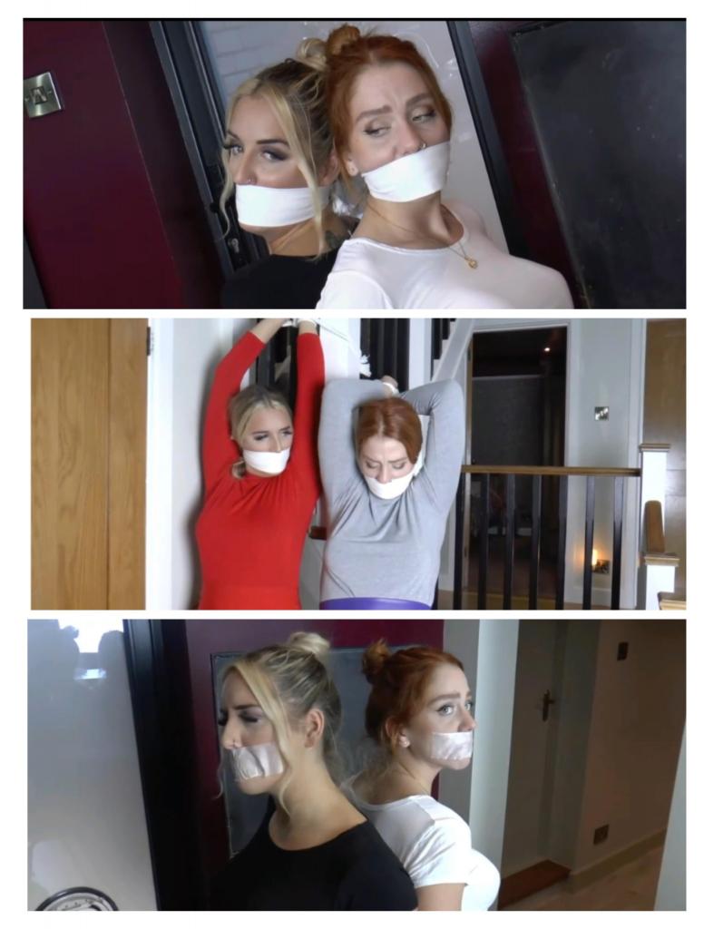 Daisy &amp; Brook in: Enchanted Guests Taken Unawares by a Most 'Unverified' Individual -  Daisy & Brook in: Enchanted Guests Taken Unawares by a Most 'Unverified' Individual - But, What Does He WANT From Them? (ALL the Gags Cut)<br>A beautiful redhead and a blond are tied tightly to chairs, with even tighter still gags in their mouths to keep them quiet. Those exciting cleaves are entwined at the backs of their heads too, so each time our lovely heroines strain forward, quite desperately, in their seats, one pulls the other right forward with her as they alternate between pleading and fuming at their complete, humiliating helplessness. The kinky client (who is this guy??) has disconcertingly vanished while they squirm, trussed back-to-back, unable to stop him. But before this evening is out, he'll be indulging himself yet further by dressing the captives up the way he likes and binding and gagging them