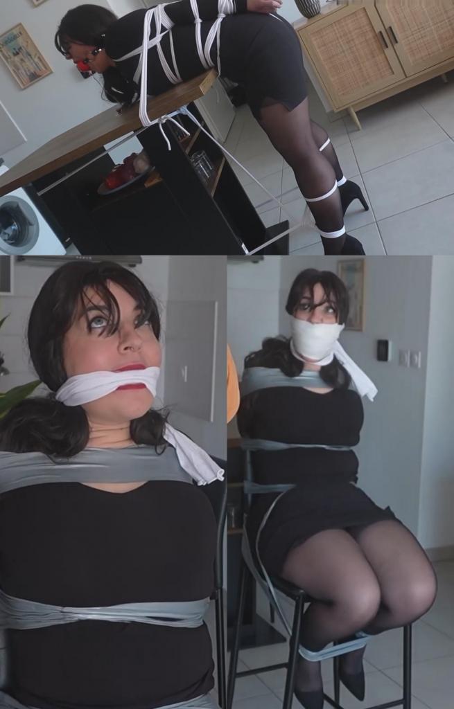 The French Girl - Bound, gagged and punished to prevent her from seeing her new unhealthy boyfriend 如果你喜欢令人印象深刻的恶作剧，以及嘴里塞满内裤或被塞满东西的声音，那么这部视频绝对适合你！<br><br>这位法国女孩正在和她的新男友通电话，她的家人都讨厌这个男友，因为他们认为他是个麻烦制造者。他利用他们的财富和这位年轻女孩的脆弱，试图敲诈勒索。一位和她住在一起的家人为了阻止她与他见面，不惜一切代价；为了达到目的，任何手段都是正当的。<br><br>当这位年轻女孩和她的继兄讨论着各种对付家人的计划时，继兄偷偷地听着他们的对话，意识到他们又有了新的敲诈勒索计划——至少，这是她男友的希望。当他无意中听到他们要见面的计划时，他冲进房间打断了他们的谈话，两人随即爆发了争吵。这位年轻女孩不听他的劝告，于是他决定采取行动。<br><br>他把她拖到自己身边，为了固定住她，用胶带把她绑在了椅子上。法国女孩继续用挑衅的语气回答他。他厌恶她的语气，想要惩罚她，于是去她的房间拿了一条脏内裤和一大块布。她命令他放开她，但他却把内裤塞进她嘴里，然后用一个厚厚的口塞堵住了她的嘴，让她瞬间哑口无言。她傲慢的语气变成了愤怒的呻吟：“嗯 ...她的继兄立刻回来，又把内裤塞进她嘴里，仿佛这还不够，他竟然又塞了一条！现在，她嘴里被严丝合缝的微孔泡沫胶带包裹得严严实实，根本无法自行解开。她真应该只用简单的口塞，因为她的嘴现在完全被堵住了，听得更难了。法国女孩再次挣扎，直到手机响了。是她男朋友打来的。她的继兄接了电话，说她很忙，没空说话。这倒也属实，因为嘴里塞着东西，她怎么可能说话？她试图大声喊叫，让他听见，但根本不可能，这让她既愤怒又沮丧。她被绑着，嘴里塞着东西，怎么可能发出求救信号？她呻吟、尖叫、哀求，但一切都无济于事。<br><br>经过一番挣扎，有人敲门。是她男朋友，来确认事情是否属实。但开门迎接他的不是她；是她的继兄。他解释说她不能见他，最好离开。背景中，我们看到那个法国女孩拼命地想让他听到自己的声音。她彻底绝望了！他明明近在咫尺，却又远在天边。他走后，继兄又回来嘲讽她，说她以后再也见不到他了。她怒视着他，低声嘟囔着：“嗯嗯嗯嗯嗯！”我们可以推测她是在侮辱他，但她一句话也说不出来。她被用厚胶带捆绑，嘴也被堵住，就这样被绑了好几个小时。但她的怒火非但没有平息，反而愈发高涨。是时候进一步羞辱她，惩罚她了。<br><br>她现在被绳子绑了起来。她的双手、双臂和手肘都被牢牢地绑在背后。她的躯干和胸部也被捆绑着。她弯着腰靠在桌子上，露出臀部和紧身裙。她的双腿被绑在桌子的中间腿上。这种屈辱又难受的姿势，理应让他三思而后行。然而，她却继续侮辱他。还有什么比狠狠地打她屁股更能惩罚她的呢？为了让她再次闭嘴，她的继兄又用了一个巨大的口塞，但这次不是同一个：一个直径2.2英寸的球形口塞！当这个可怕的口塞塞进嘴里时，这位年轻的法国女子瞪大了眼睛，口水也止不住地流了下来。<br><br>她就这样屈辱又难受的姿势保持了几个小时。桌子上沾满了口水，她美丽的头发上也沾满了口水。If you enjoy impressive gags and the sound of a mouth full of panties or a huge gag, this video is for you!<br><br>The French Girl is on the phone with her new boyfriend, whom her entire family despises because they consider him a source of trouble. He takes advantage of their wealth and the young woman's vulnerability to try and extort money from them. A family member, who lives with her, is ready to do anything to prevent her from seeing him; any means are justified to achieve this.<br><br>While she discusses various schemes against her family, the young woman's stepbrother secretly listens to the conversation and realizes they have a new plan to extort money from them—at least, that's what her boyfriend hopes. When he overhears their plan to meet, he bursts into the room to interrupt the conversation, and an argument breaks out between the two. The young woman refuses to listen to him, so he decides to take action.<br><br>He drags her over to him and, to hold her in place, tapes her to the chair. The French Girl continues to answer him in a provocative tone. Disliking his tone and wanting to punish her, he goes to her room to get a dirty pair of panties and a large piece of fabric. She orders him to release her, but instead, he shoves the panties into her mouth and then uses a thick cleave gag that instantly silences her. Her insolent tone turns into an angry moan: "MMmmhHAarggmmmmhhpppfffffhhh!!!" After securely tying her to the chair, legs raised, and gagging her, he can go about his business, certain that she will never manage to free herself. For a long time, The French Girl struggles to free herself, but the amount of tape was enormous and the gag incredibly tight! Finally, she manages to spit out the panties that were stuffed in her mouth. She called out to him and started screaming, ordering him to come back and stop. But the order was clear: she wasn't to move, and she would be punished if necessary.<br><br>Her stepbrother immediately returned and shoved the panties into her mouth again, but as if that wasn't enough, he added a second pair! The whole thing was now wrapped in perfectly airtight micro-foam tape, impossible to remove on her own. She should have just used the simple gag, because her mouth was now completely filled, making it even harder to hear. The French Girl struggled again until her phone rang. It was her boyfriend trying to call her. Her stepbrother answered to tell her she was busy and couldn't talk. Which was true, because with such a gag, how could she possibly speak? She tried to shout for him to hear her, but it was impossible, which filled her with fury and frustration. How could she signal that she needed help when she was tied up and gagged like that? She moaned, screamed, and begged, all to no avail.<br><br>After a long struggle, there was a knock at the door. It was her boyfriend, come to check if it was true. But it wasn't her who opened the door and greeted him; it was her stepbrother. He explained that she couldn't see him and that it was best to leave. In the background, we see The French Girl trying desperately to make herself heard. Her despair is complete! He is so close, and yet so far away. Once he's gone, the stepbrother returns and mocks her, telling her she won't see him again anytime soon. She glares at him and mutters, "MMMMmmhhhMMmmm!" We can assume she's insulting him, but no words come out of her mouth. She remains bound with heavy-duty tape and gagged for hours. But instead of calming down, her fury grows. It's time to punish her further by humiliating her.<br><br>She is now tied up with rope. Her hands, arms, and elbows are securely bound behind her back. Her torso and chest are also bound. She stands with her torso bent forward against the table, exposing her buttocks and tight skirt. Her legs are tied to the table's center leg. This humiliating and uncomfortable position should surely make him think twice. Instead, she continues to insult him. What better way to punish her than a good spanking? To silence her again, her stepbrother uses another enormous gag, but not the same one: a 2.2-inch ball gag! The young French woman's eyes widen when she receives this terrible gag in her mouth, which makes her drool profusely.<br><br>She remained in that humiliating and uncomfortable position for hours. The table was covered in drool, as was her beautiful hair.