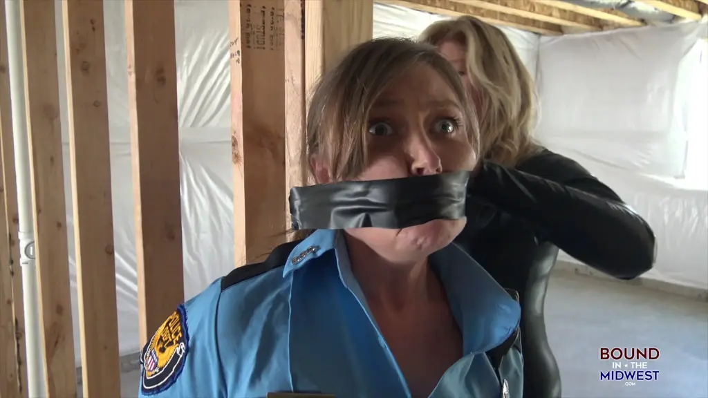 Officers Tied Downstairs Officers Tied Downstairs<br>bound and gagged ploicewoman