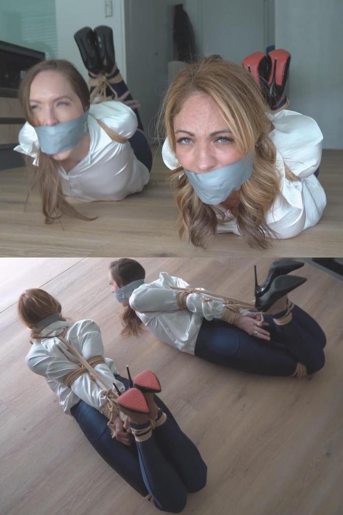 PSJ-2026-AZ-RA-01 - Alba &amp; Rachel: Agents In Trouble 特工阿尔芭和瑞秋都穿着紧身迪斯科裤和白色衬衫，搜查彼得的房间，寻找证据和数据。他经营着一家名为“麦格芬”的非法生意。但她们犯了一个好莱坞电影里经常提到的大错：她们分头搜查房间。瑞秋在另一个房间搜查时，阿尔芭留在了原地。但她万万没想到，彼得早已对她们俩做好了准备。他制服了阿尔芭，把她按倒在地，从包里掏出绳子，开始捆绑她，让她动弹不得，这时瑞秋回来了。彼得绑住阿尔芭的手肘，堵住她的嘴，然后把挣扎的阿尔芭也捆成猪蹄状，等着瑞秋找到她，让她也遭遇同样的命运。瑞秋很快回来，试图解开阿尔芭的绳子，但为时已晚。彼得也抓住了她，她也被紧紧地捆绑起来，嘴巴也被堵住，和阿尔芭一起躺在地板上。彼得完事后，没有时间浪费。他必须离开，留下两个手肘被压扁的女人躺在地板上。屏幕绑定   BTS。Special Agents Alba and Rachel, both wearing tight disco pants and white blouses, search Peters room in order to find evidence and data. He runs a shady business called "McGuffin". But then they do a huge mistake, Hollywood always warned us about: They seperate to search the rooms. While Rachel is searching in another room, Alba remains there. But little did she know that Peter prepared himself for both of the agents. He overpowers her and brings her to the ground, pulling out ropes out of a bag and starts to render her helpless, before Rachel returns. After he tied her elbows and gagged her, he folds protesting Alba into a hogtie for Rachel to find her and face a similar fate. Rachel soon returns and tries to untie Alba, but its to late. Peter catches her aswell, and she also ends up tightly hogtied and gagged on the floor next to Alba. After he is done, Peter has no time to lose. He has to leave and both ladies, with their elbows crushed are left on the floor. Onscreen Tying   BTS.
