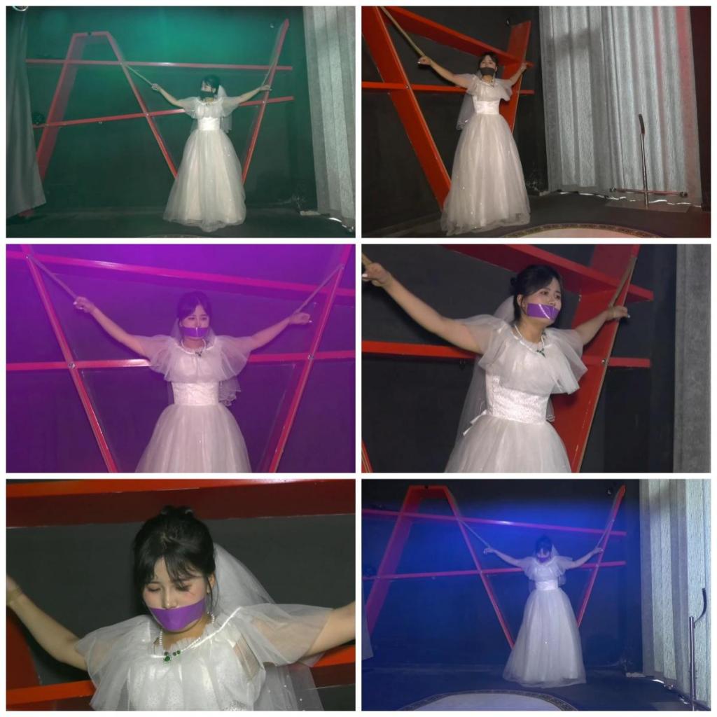 会所里捆绑婚纱女M 二 穿着婚纱的新娘子被金主买来训练成女M，被胶带封嘴大字捆绑在刑架上挣扎，长时间放置折磨。<br>另外招聘模特，喜欢做模特拍片可以联系我们，定拍QQ342642509
