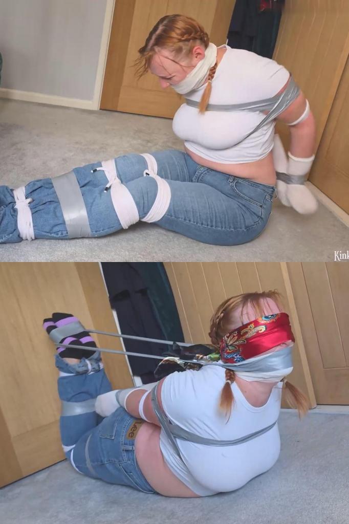 Captured Kerry babysitter tricked tied taped and blindfolded  我特别喜欢看穿着休闲装（如牛仔裤、T恤和袜子）的年轻女性被捆绑的样子。这次的场景设定非常契合“保姆”这一角色设定。<br><br>Kerry 完美演绎了一位天真的保姆，听她那悦耳柔和的苏格兰口音说话（无论是否被堵住嘴）都是一种享受。<br><br>她顺从地参与了一场游戏，希望能借此在事后如愿以偿。遗憾的是，这次事与愿违。在同意被捆绑和堵嘴后，Kerry 在床上嬉戏般地挣扎了几分钟，直到她觉得玩够了为止。<br><br>然而，她并没有获得松绑，反而发现自己被捆绑着移到了地板上。她的双手被套上了袜子，以防她解开那些棘手的绳结；除了原有的绳索外，她的胸部、双腿和脚上也缠绕了胶带。由于她之前能挣脱简单的胶带口塞，这次她被多层紧实的兽用自粘绷带（vetwrap）严严实实地封住了嘴，根本无法挣脱。尽管她在接下来的几分钟里拼命挣扎，却始终无法摆脱困境。<br><br>在视频的剩余部分，Kerry 保持着“猪蹄扣”式（hogtie）的捆绑姿势（或者说是用胶带捆绑成的这种姿势）被困在地板上。胶带不仅覆盖了她的口塞，还缠绕在她被胶带捆住的双脚上，将她拉成了经典的“猪蹄扣”姿势。为了增加她的无助感，她还被一条大丝巾蒙住了双眼。她疯狂的挣扎虽然拉伸了胶带，但胶带的强度极高，根本无法挣断。I do enjoy seeing a damsel tied in a casual outfit like jeans, t-shirt and socks. In this instance, the outfit leant itself perfectly to a babysitter scenario.<br><br>Kerry perfectly plays the naïve babysitter, and hearing her speak in her lovely soft Scottish accent (both with and without a gag) is beautiful.<br><br>She goes along with playing a game in the hope that she can get her own way afterwards. Unfortunately, that was not the case this time. After agreeing to be tied and gagged, Kerry playfully struggles on the bed for a couple of minutes, until she's had enough.<br><br>Instead of being untied, however, Kerry now finds herself tied on the floor. Socks have been placed over her hands to stop her from untying any pesky knots, and tape been applied to her chest, legs and feet, in addition to the existing rope. As she was able to take off her simple tape gag from earlier, Kerry is now gagged with multiple layers of tight vetwrap, which she has no chance of removing. As much as she struggles over the next few minutes, she still gets no closer to escaping her predicament.<br><br>For the rest of the video, Kerry is hogtied (or hogtaped) on the floor. Tape has been placed over her gag and wrapped around her taped feet, pulling her into a classic hogtie position. To add to her helplessness, she has also been blindfolded with a big silk scarf. Her frantic struggling stretches out the tape, but it is far too strong to break.